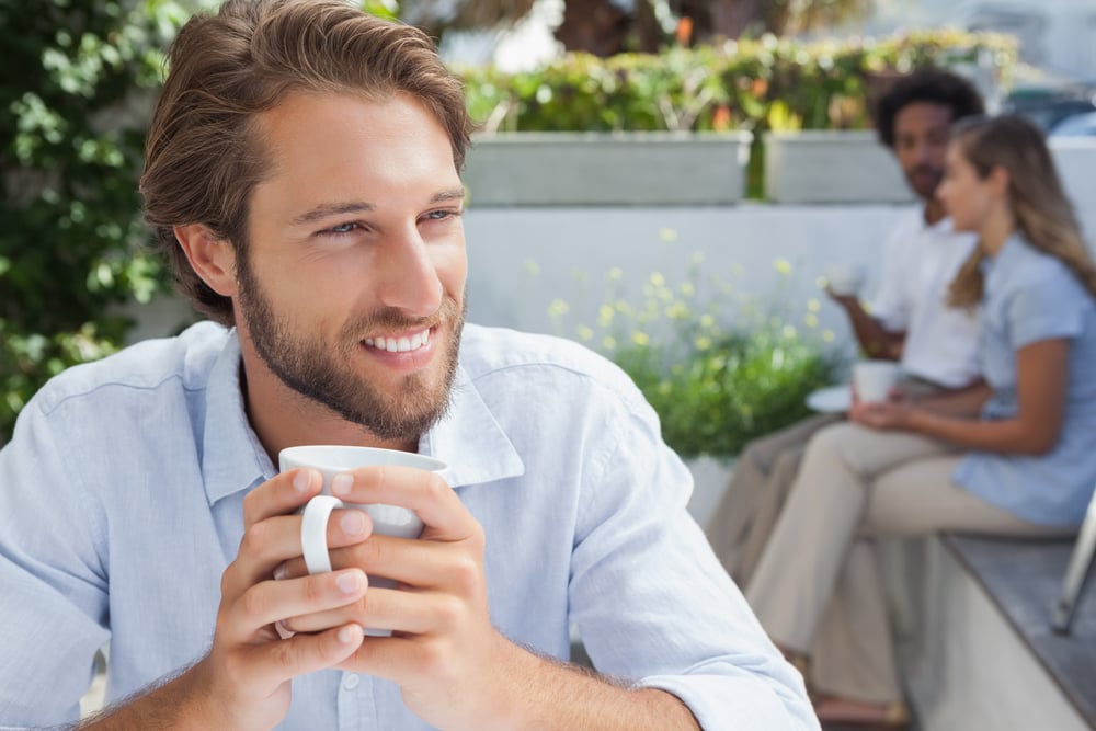 Thoughtful man having a coffee outside at the coffee shop Thoughtful man having a coffee outside at the coffee shop